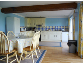 Kitchen-dining room with french doors leading to patio